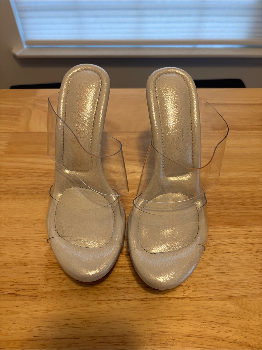 Elegant White Heeled Sandals with Clear Straps